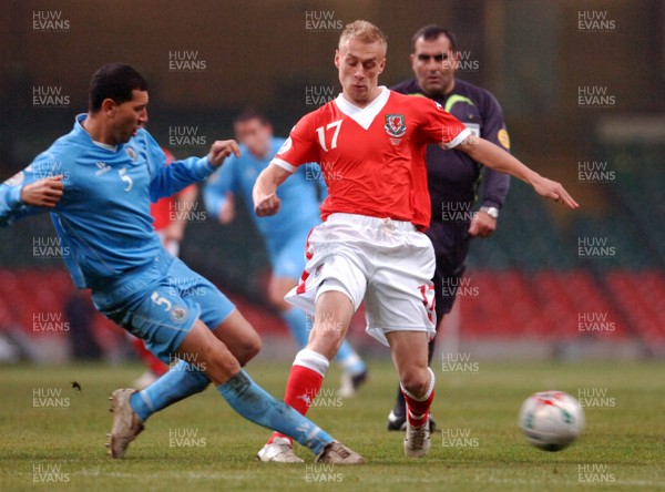 28.03.07 - Euro 2008 Qualifier Wales v San Marino Wales' David Cotterill is tackled by Riccardo Muccioli 