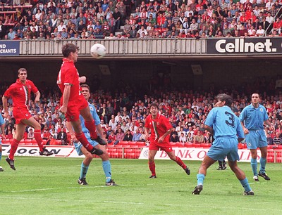 310896 - Wales v San Marino - Mark Hughes and Dean Saunders (right) of Wales in action