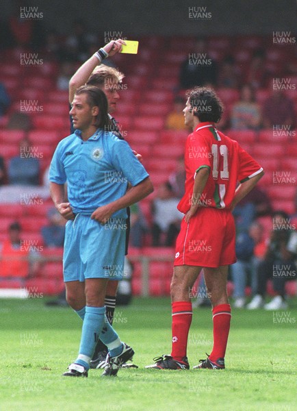 310896 - Wales v San Marino - Ryan Giggs of Wales is shown a yellow card