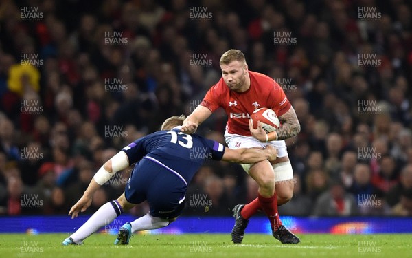 030218 - Wales v Scotland - NatWest 6 Nations 2018 - Ross Moriarty of Wales is tackled by Chris Harris of Scotland