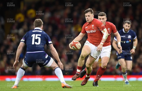 030218 - Wales v Scotland - NatWest 6 Nations 2018 - Steff Evans of Wales takes on Stuart Hogg of Scotland