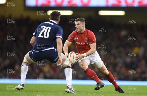 030218 - Wales v Scotland - NatWest 6 Nations 2018 - Scott Williams of Wales is tackled by Ryan Wilson of Scotland