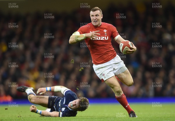 030218 - Wales v Scotland - NatWest 6 Nations 2018 - Hadleigh Parkes of Wales gets past Huw Jones of Scotland