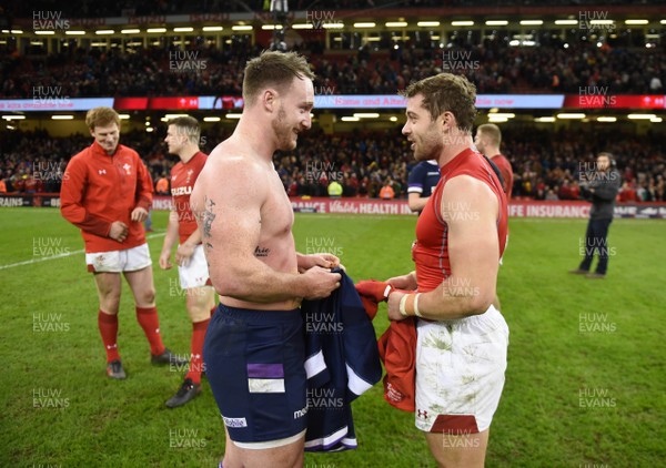 030218 - Wales v Scotland - NatWest 6 Nations 2018 - Stuart Hogg of Scotland and Leigh Halfpenny of Wales at the end of the game