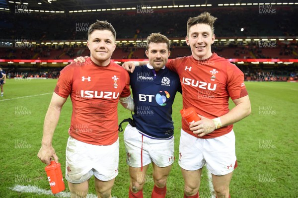 030218 - Wales v Scotland - NatWest 6 Nations 2018 - Steff Evans, Leigh Halfpenny and Josh Adams of Wales at the end of the game
