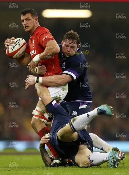030218 - Wales v Scotland - Natwest 6 Nations - Aaron Shingler of Wales is tackled by Gordon Reid and Jon Welsh of Scotland