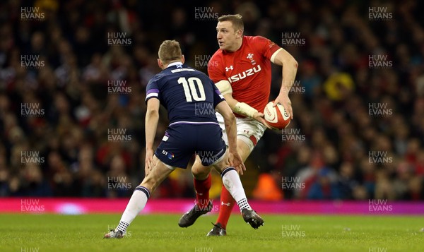 030218 - Wales v Scotland - Natwest 6 Nations - Hadleigh Parkes of Wales is challenged by Finn Russell of Scotland