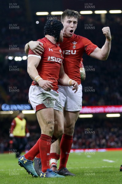 030218 - Wales v Scotland - Natwest 6 Nations - Leigh Halfpenny of Wales celebrates scoring a try with Josh Adams