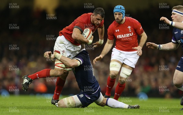 030218 - Wales v Scotland - Natwest 6 Nations - Aaron Shingler of Wales is tackled by John Barclay of Scotland