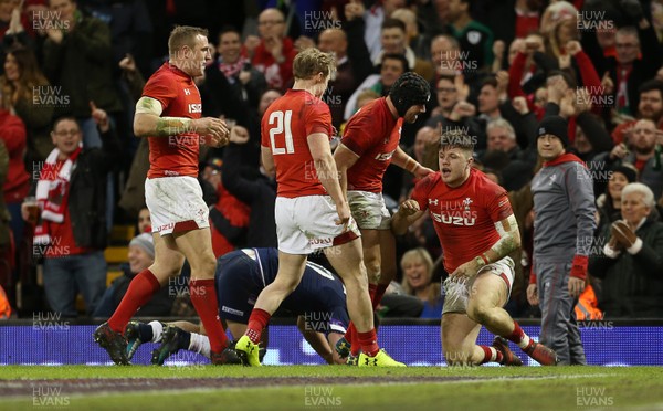 030218 - Wales v Scotland - Natwest 6 Nations - Steff Evans of Wales celebrates with team mates after scoring a try