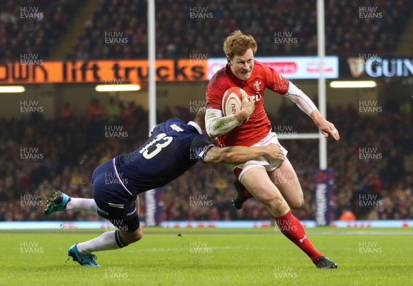 030218 - Wales v Scotland, NatWest 6 Nations - Rhys Patchell of Wales is tackled by Chris Harris of Scotland  