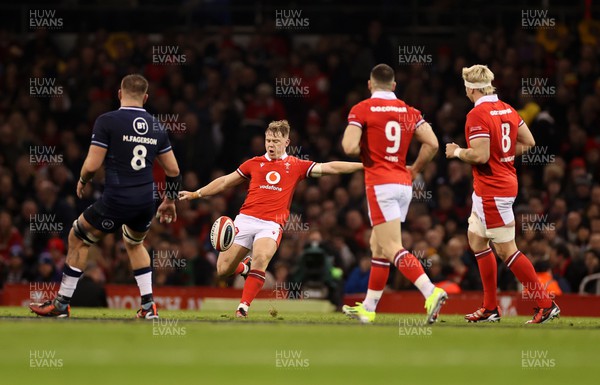 030224 - Wales v Scotland - Guinness 6 Nations 2024 - Sam Costelow of Wales kicks the ball up field