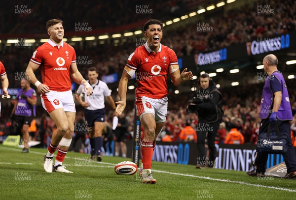 030224 - Wales v Scotland - Guinness 6 Nations 2024 - Rio Dyer of Wales celebrates scoring a try