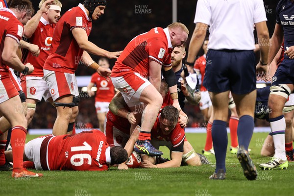 030224 - Wales v Scotland - Guinness 6 Nations 2024 - Alex Mann of Wales celebrates scoring a try with team mates