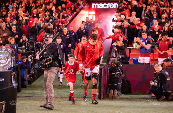 030224 - Wales v Scotland - Guinness 6 Nations 2024 - Dafydd Jenkins of Wales walks out the mascot