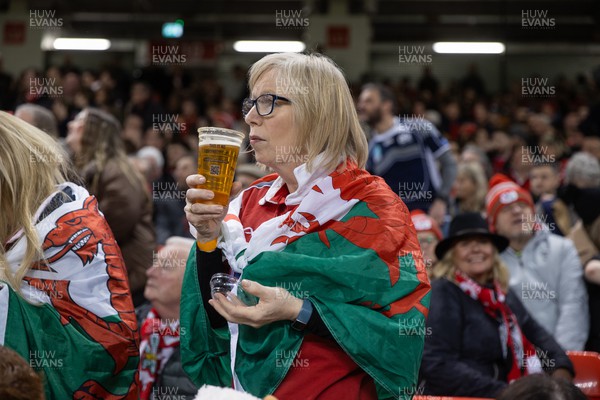 030224 - Wales v Scotland - Guinness 6 Nations 2024 - A fan with a drink during the game