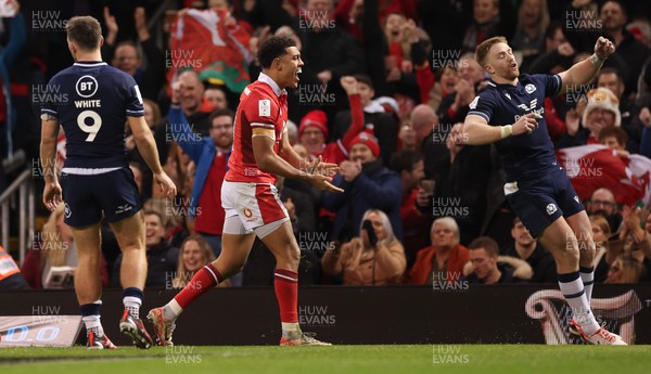 030224 - Wales v Scotland, Guinness Six Nations 2024 - Rio Dyer of Wales celebrates after he dives in to score try