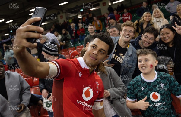 030224 - Wales v Scotland, Guinness Six Nations 2024 - Rio Dyer of Wales poses for a selfie with fans after the match