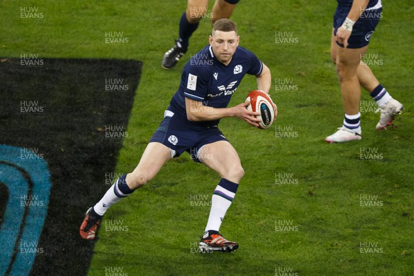 030224 - Wales v Scotland - Guinness Six Nations - Finn Russell of Scotland passes the ball