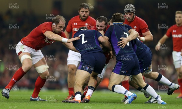 031118 - Wales v Scotland - Under Armour Series - Ken Owens of Wales is tackled by Stuart McInally and Hamish Watson of Scotland