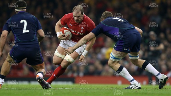 031118 - Wales v Scotland - Under Armour Series - Alun Wyn Jones of Wales is tackled by Jonny Gray of Scotland