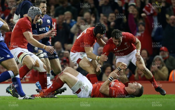 031118 - Wales v Scotland - Under Armour Series - George North of Wales celebrates scoring a try with Jonathan Davies, Leigh Halfpenny and Luke Morgan of Wales