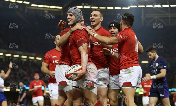 031118 - Wales v Scotland - Under Armour Series - Jonathan Davies of Wales celebrates scoring a try with team mates
