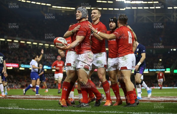 031118 - Wales v Scotland - Under Armour Series - Jonathan Davies of Wales celebrates scoring a try with team mates