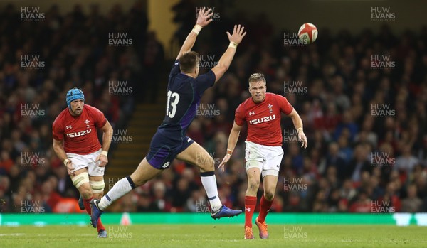 031118 - Wales v Scotland - Under Armour Series - Gareth Anscombe of Wales chips the ball past Huw Jones of Scotland