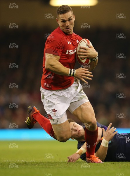 031118 - Wales v Scotland, Under Armour Series 2018 - George North of Wales crashes through the tackle from Huw Jones of Scotland to score try