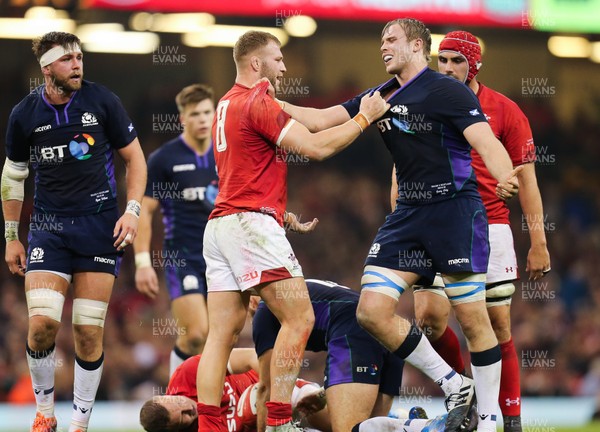 031118 - Wales v Scotland, Under Armour Series 2018 - Ross Moriarty of Wales and Jonny Gray of Scotland grab each others shirts as they square up