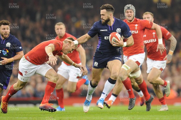 031118 - Wales v Scotland - Under Armour Series - Alex Dunbar of Scotland is tackled by Gareth Anscombe of Wales 