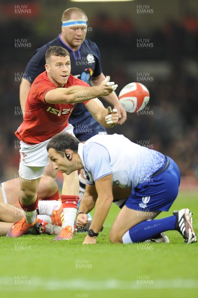 031118 - Wales v Scotland - Under Armour Series - Gareth Davies of Wales passes over the head of referee Mathieu Raynal