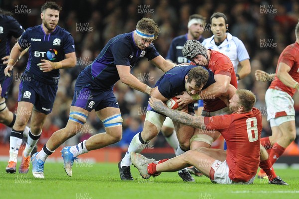031118 - Wales v Scotland - Under Armour Series - Fraser Brown of Scotland is tackled by Dan Lydiate of Wales  and Ross Moriarty of Wales 
