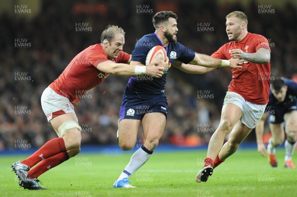 031118 - Wales v Scotland - Under Armour Series - Alex Dunbar of Scotland is tackled by Alun Wyn Jones of Wales and Ross Moriarty of Wales 