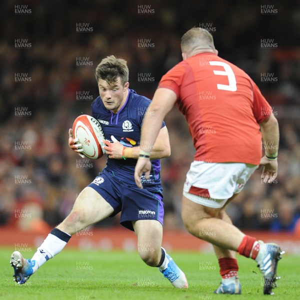 031118 - Wales v Scotland - Under Armour Series - George Horne of Scotland takes on Dillon Lewis of Wales 