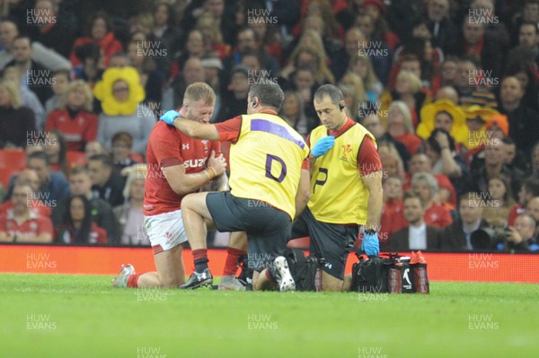 031118 - Wales v Scotland - Under Armour Series - Ross Moriarty of Wales receives treatment for an injury