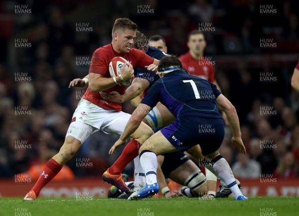 031118 - Wales v Scotland - Doddle Weir Cup -  Gareth Anscombe of Wales is tackled by Jonny Gray and Hamish Watson of Scotland 