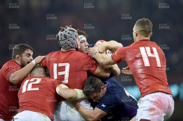 031118 - Wales v Scotland - Doddle Weir Cup -  Hamish Watson of Scotland is tackled by Jonathan Davies of Wales 
