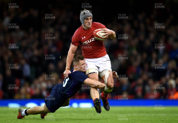 031118 - Wales v Scotland - Under Armour Series - Jonathan Davies of Wales is tackled by Huw Jones of Scotland