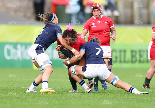 091022 - Wales v Scotland, Women’s Rugby World Cup 2021 Pool A - Georgia Evans of Wales is tackled by Louise McMillan of Scotland