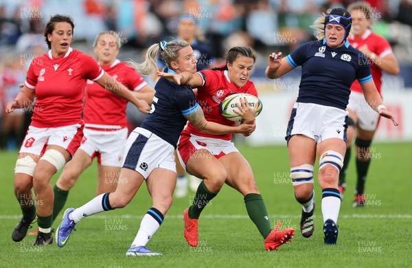 091022 - Wales v Scotland, Women’s Rugby World Cup 2021 Pool A - Ffion Lewis of Wales is tackled by Chloe Rollie of Scotland