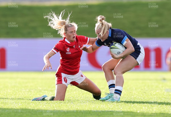 091022 - Wales v Scotland, Women’s Rugby World Cup 2021 Pool A - Megan Webb of Wales tackles Megan Gaffney of Scotland