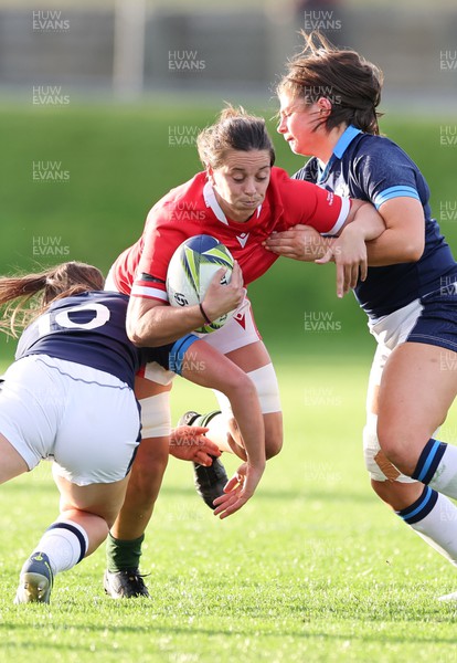 091022 - Wales v Scotland, Women’s Rugby World Cup 2021 Pool A - Sioned Harries of Wales is tackled by Helen Nelson of Scotland