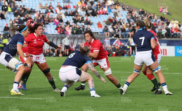 091022 - Wales v Scotland, Women’s Rugby World Cup 2021 Pool A - Sioned Harries of Wales drives towards Jade Konkel-Roberts of Scotland