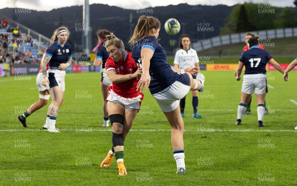 091022 - Wales v Scotland, Women’s Rugby World Cup 2021 Pool A - Keira Bevan of Wales closes down Helen Nelson of Scotland