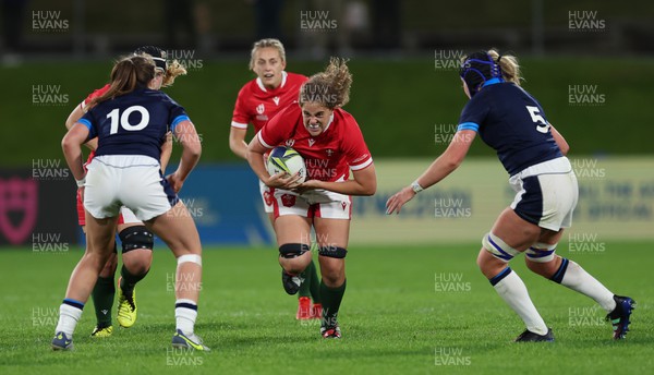 091022 - Wales v Scotland, Women’s Rugby World Cup 2021 Pool A - Natalia John of Wales charges towards Helen Nelson of Scotland and Sarah Bonar of Scotland