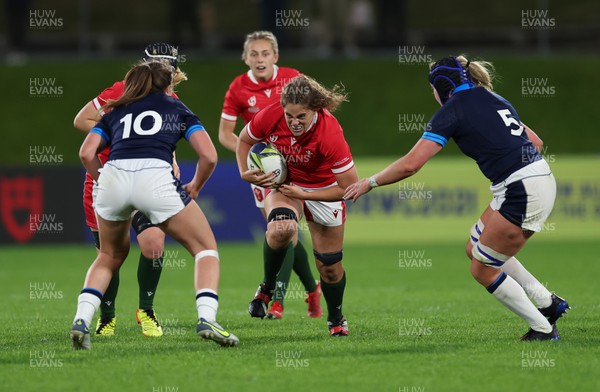 091022 - Wales v Scotland, Women’s Rugby World Cup 2021 Pool A - Natalia John of Wales charges towards Helen Nelson of Scotland and Sarah Bonar of Scotland