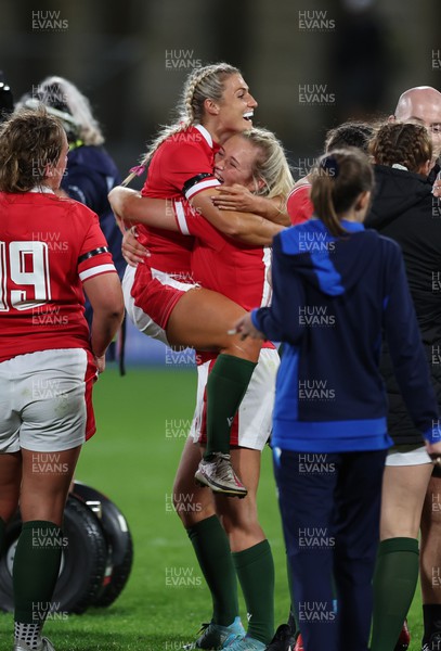 091022 - Wales v Scotland, Women’s Rugby World Cup 2021 Pool A - Lowri Norkett of Wales and Megan Webb of Wales celebrate the last gasp win as the final whistle blows