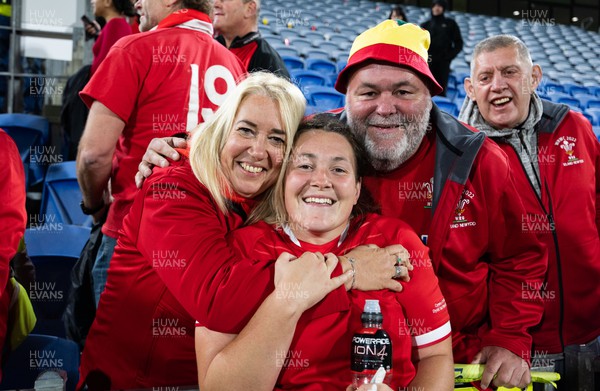 091022 - Wales v Scotland, Women’s Rugby World Cup 2021 Pool A - Cerys Hale of Walescelebrates with family and friends after the last gasp win